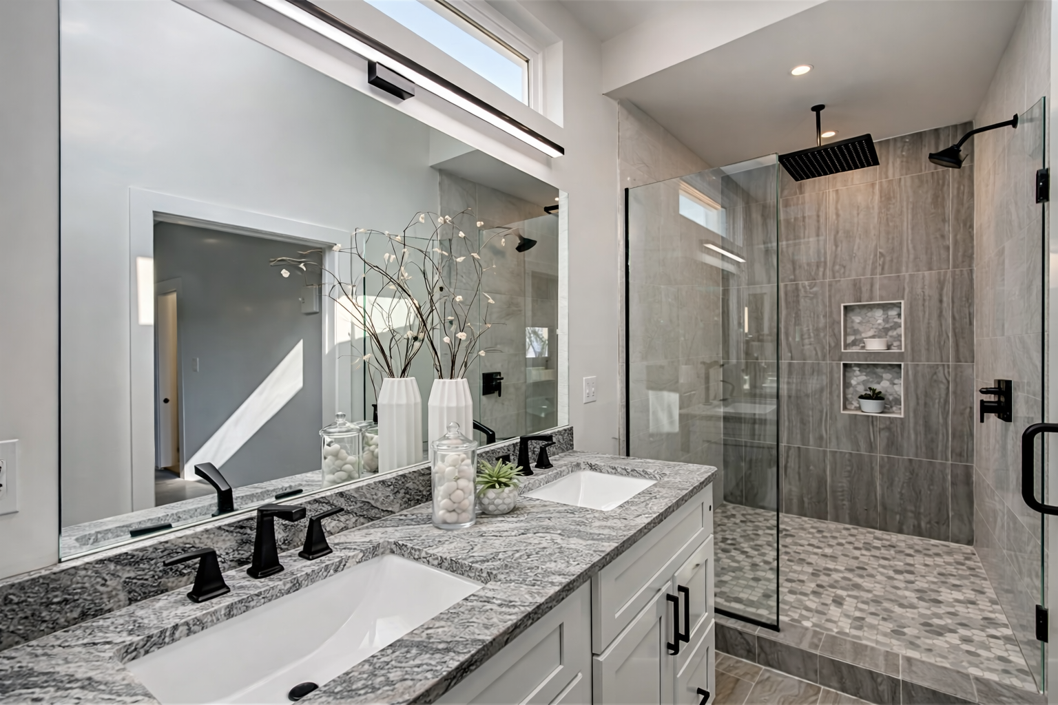 Double vanity and frameless tile shower in Indianapolis