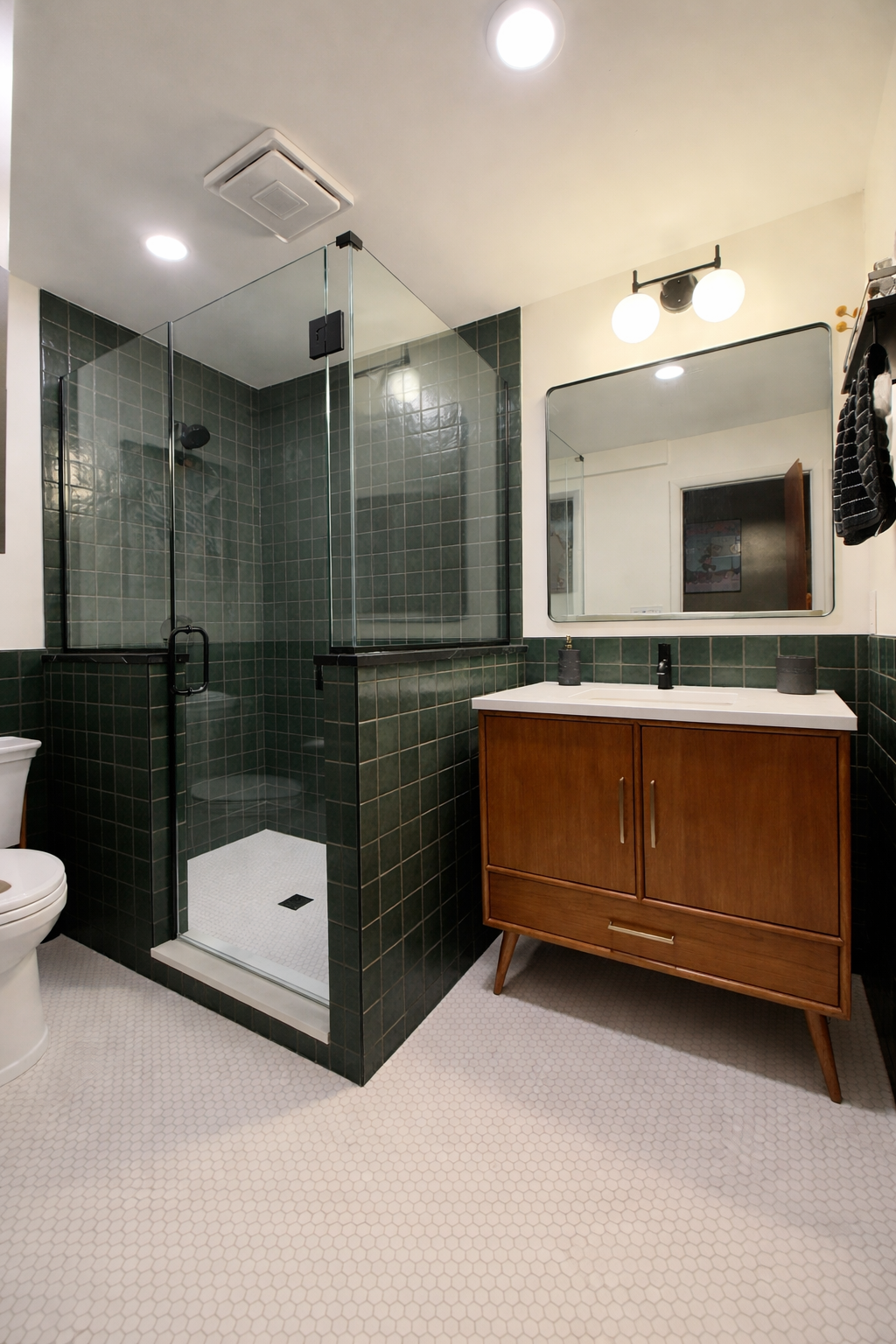 Green tile shower and walnut vanity bathroom remodel in Westfield